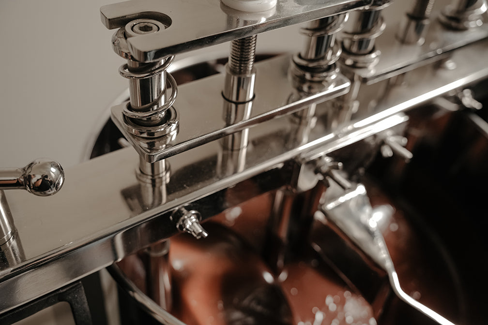 Freshly tempered chocolate bars being set in moulds